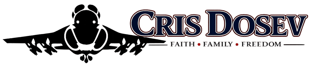 Footer logo featuring a black front-facing A-6 Intruder silhouette beside the name Cris Dosev and the tagline “Faith • Family • Freedom.”